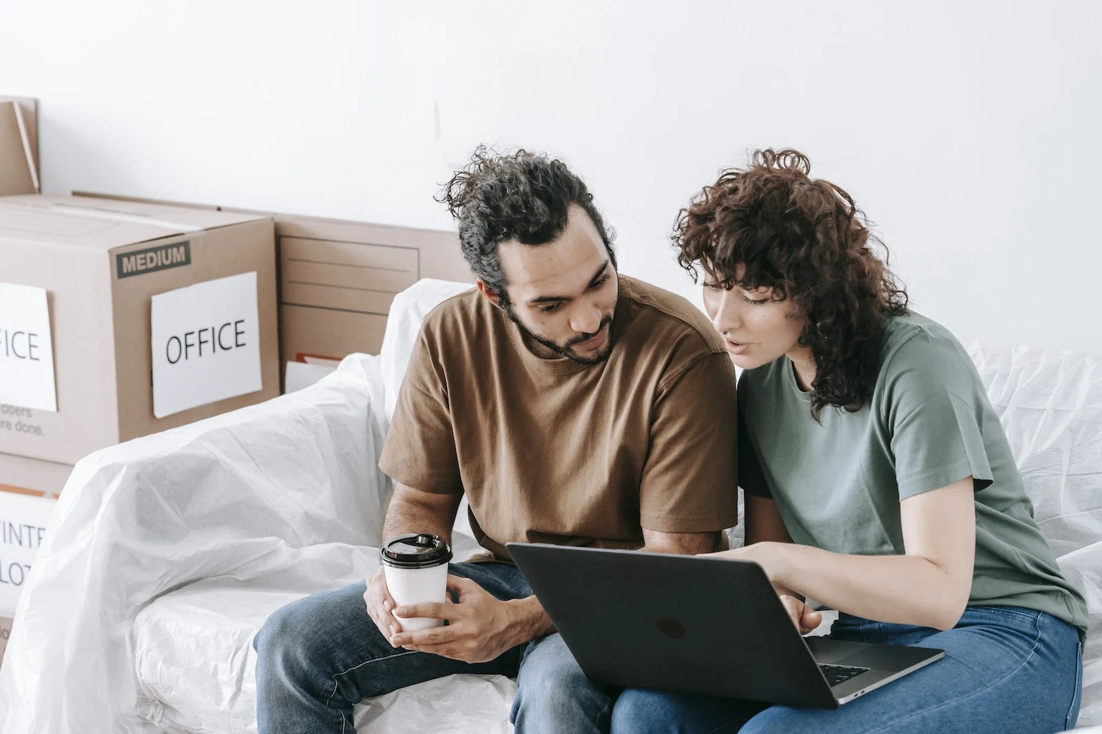 Couple Using A Laptop Computer