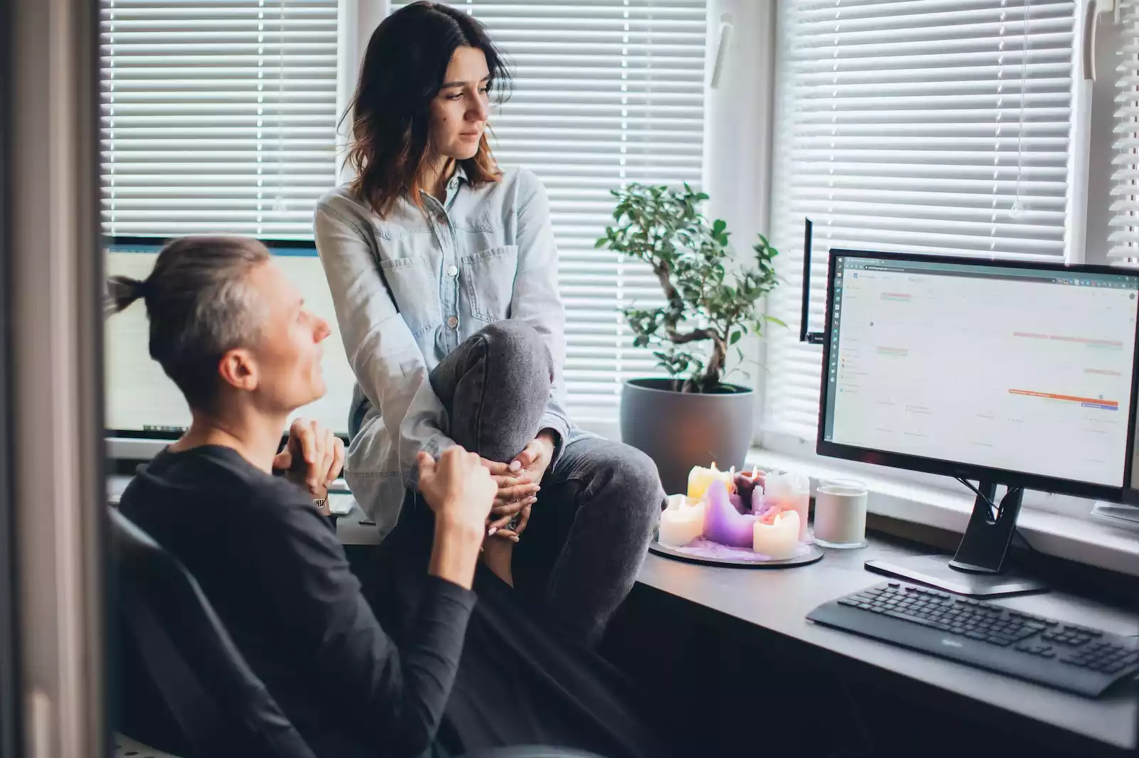 Woman Sitting on the Desk